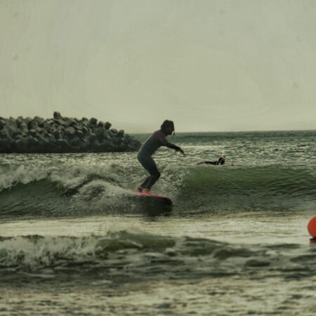 Surf la Neversea Beach